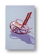 A second-hand store rocker, painted red, prized by my wife.