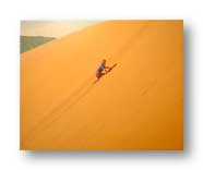 My son Peter, age 4, climbing up the side of the Coral Pink Dunes in Utah