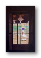 Anneliese wading in the lake at Maroon Dells in Colorado as seen from a vacant house in Pearce AZ